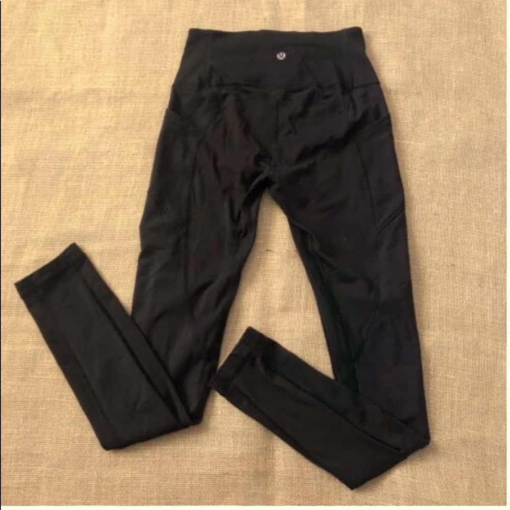 Lululemon black high rise leggings size 4